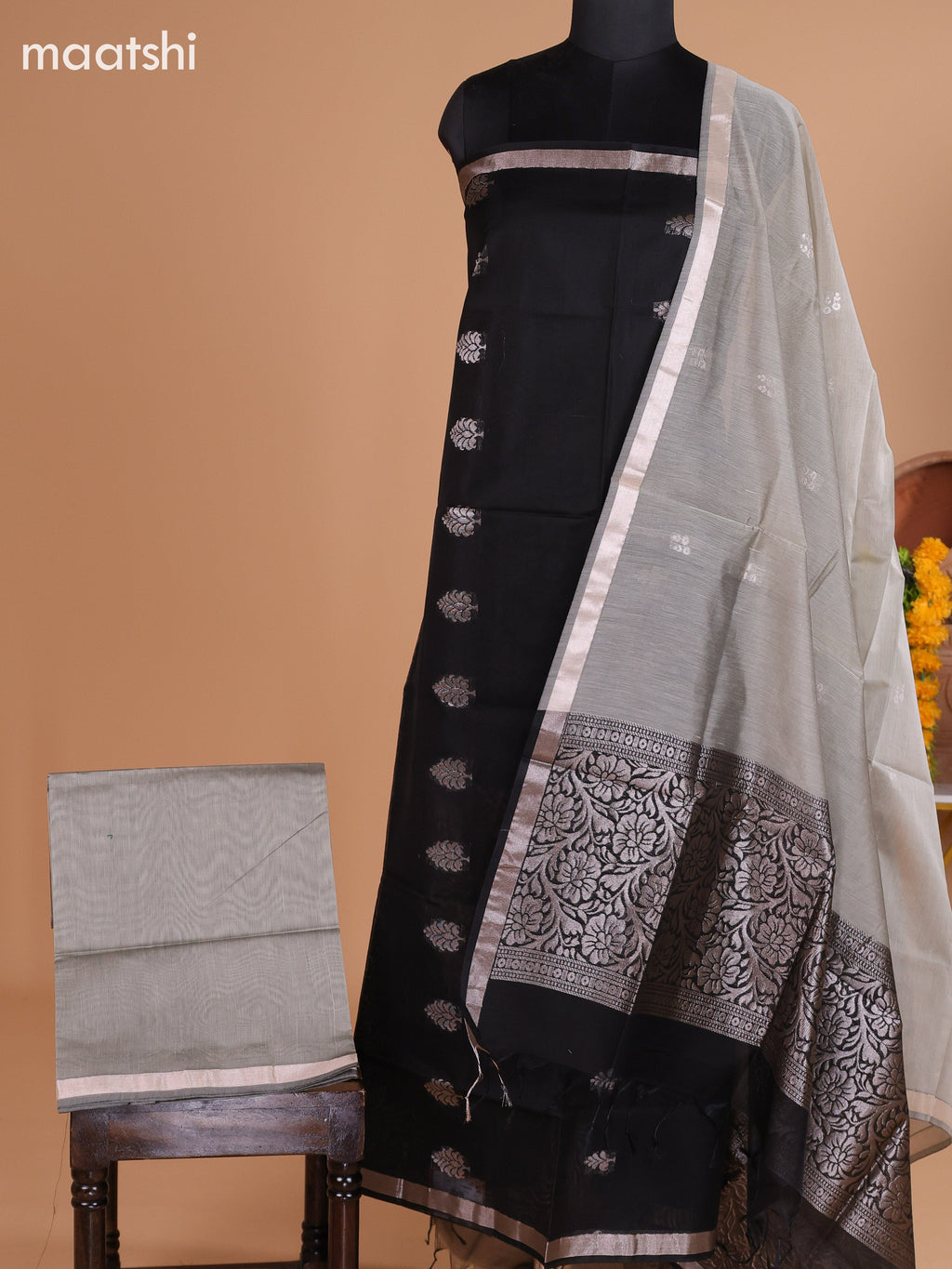 Black and Pastel Grey Semi Silk Cotton Dress Material With Zari Buttas And Bottom & Dupatta