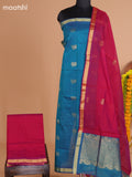 Peacock Green and Maroon Semi Silk Cotton Dress Material With Zari Buttas And Bottom & Dupatta