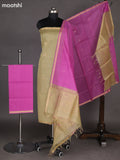 Elaichi Green and Peach Pink Silk Cotton Dress Material With Zari Woven Buttas
