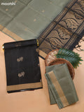 Black and Pastel Green Pure Silk Dress Material With Zari Butta