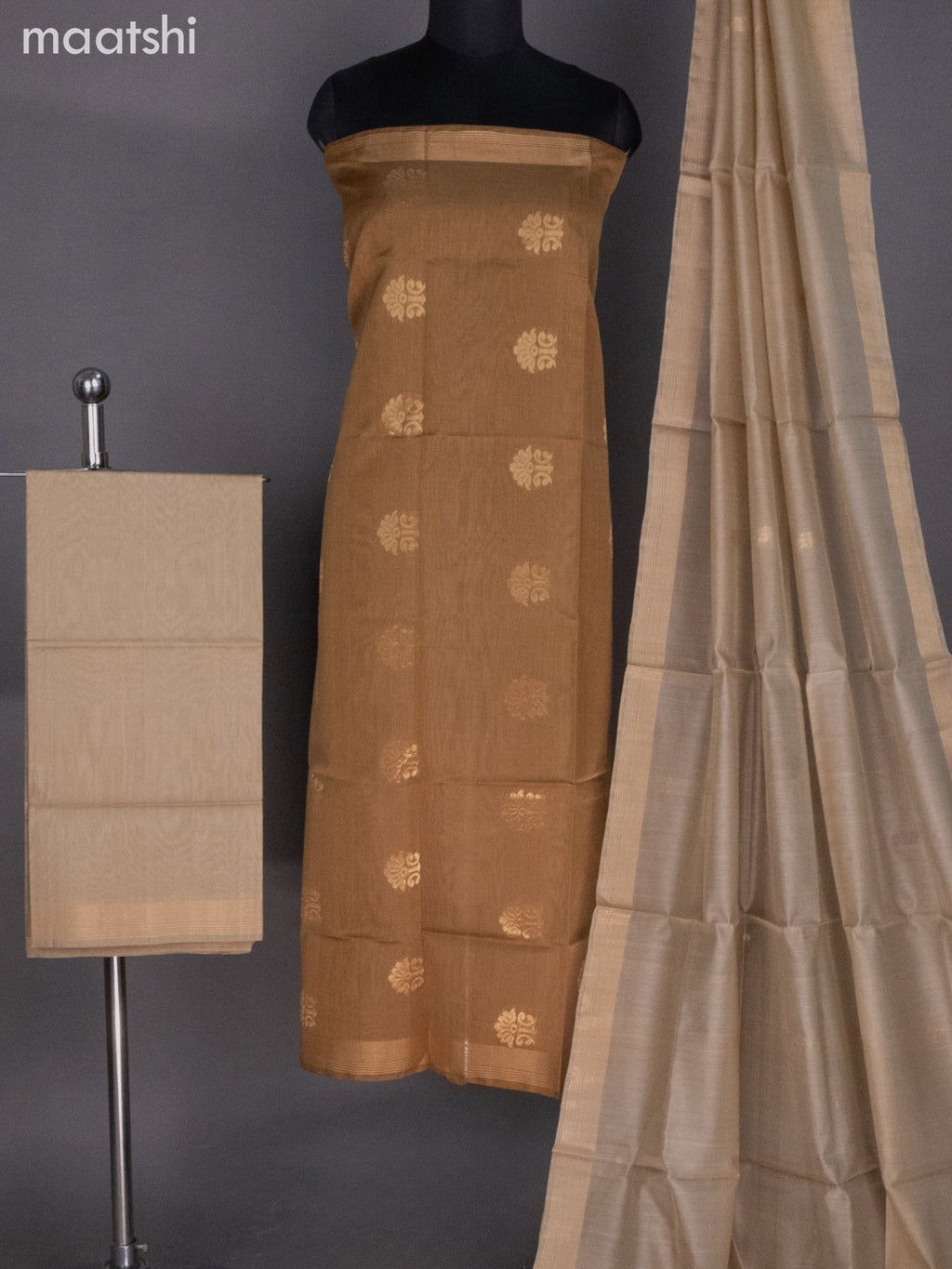 Chikku Shade and Beige Silk Cotton Dress Material With Zari Buttas