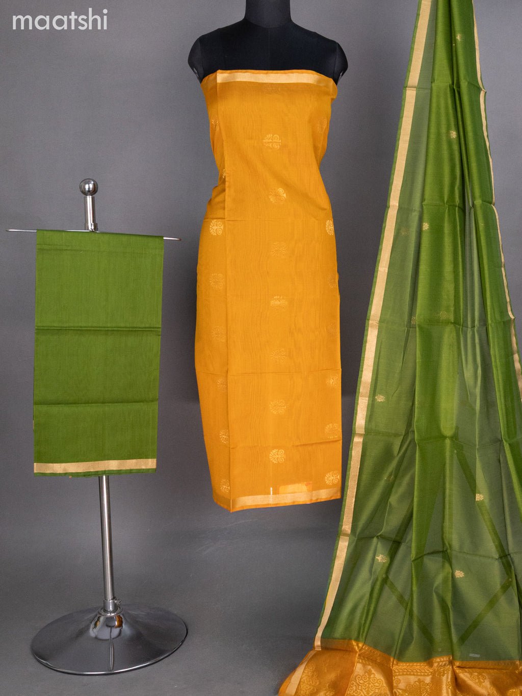 Mustard Yellow and Green Silk Cotton Dress Material With Zari Buttas