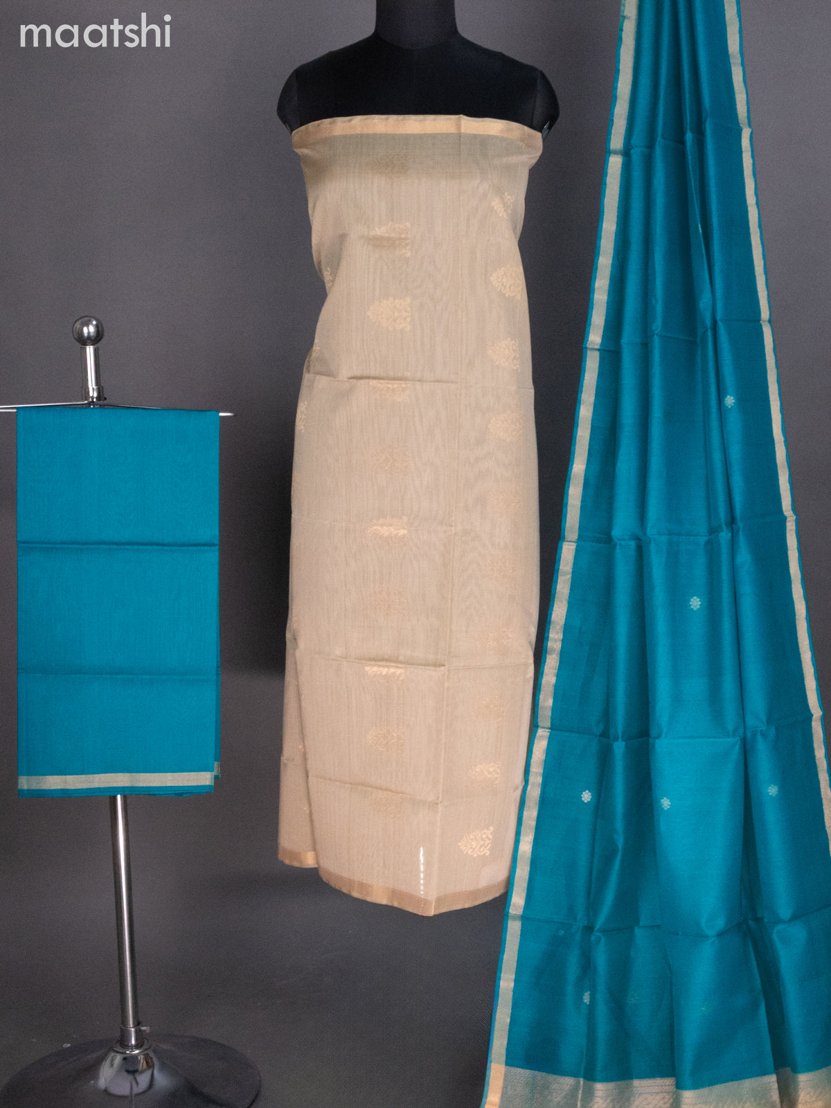 Beige and Teal Blue Silk Cotton Dress Material With Zari Buttas