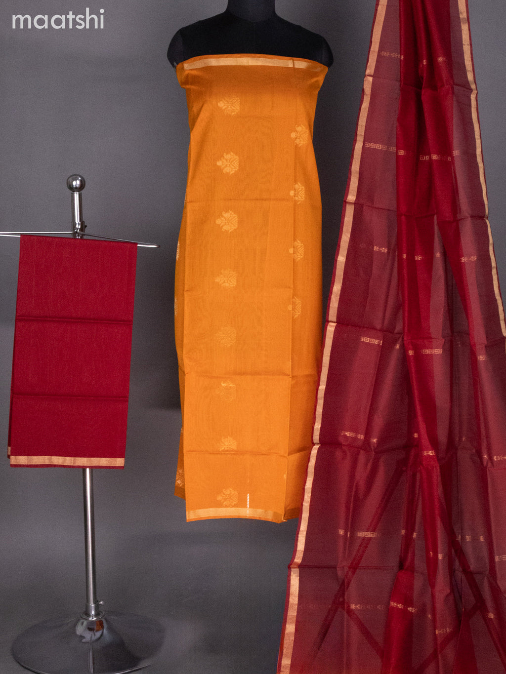 Orange and Maroon Silk Cotton Dress Material With Zari Buttas