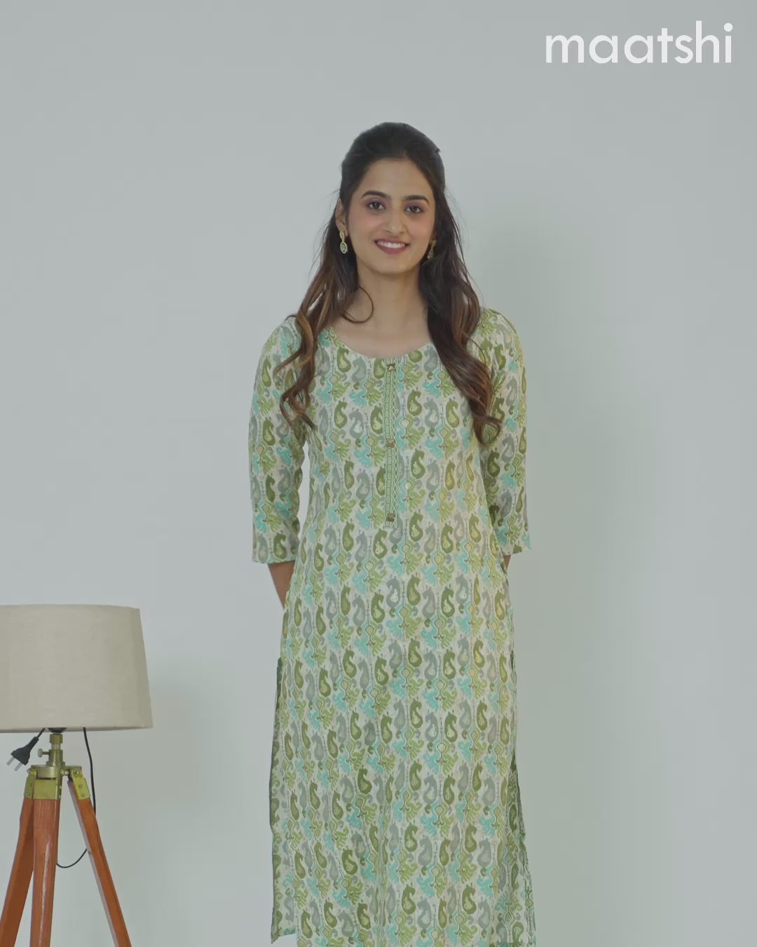 Rayon kurti set cream and mehendi green with allover ikat prints & patch work neck pattern and straight cut pant