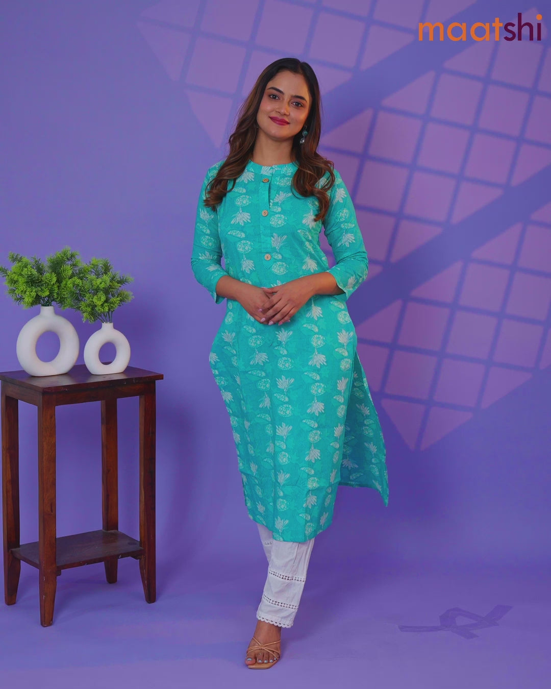 Cotton readymade kurti teal blue with allover prints & simple neck pattern and without pant
