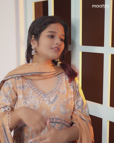 Muslin readymade alia cut salwar sutis pastel peach with allover floral prints & mirror work neck pattern and straight cut pant & printed dupatta