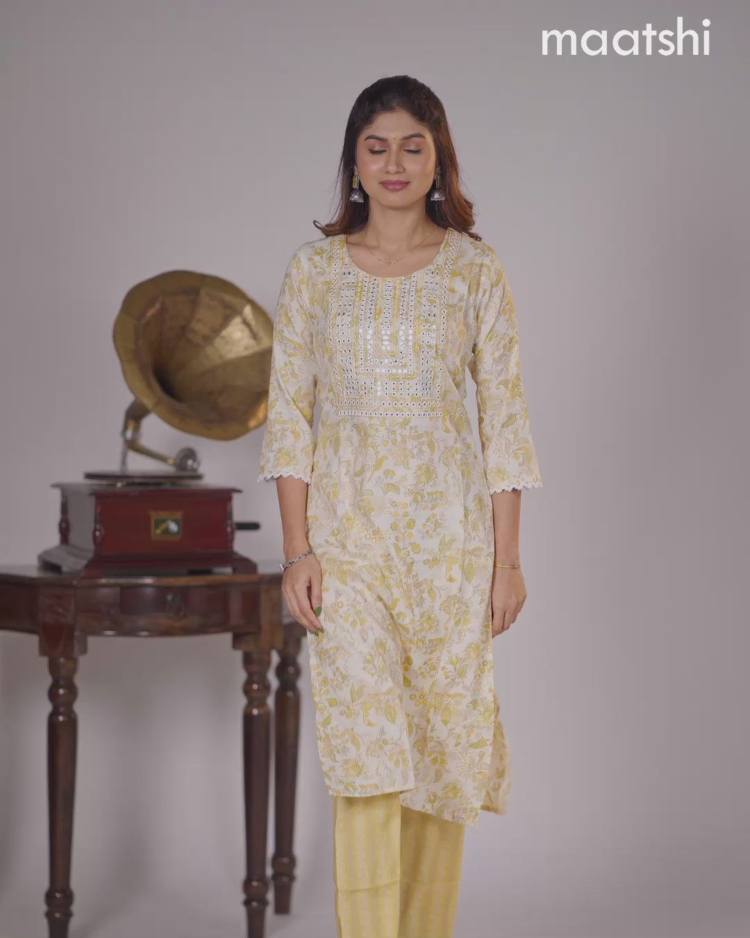 Rayon kurti cream and yellow with allover floral prints & embroidery mirror work neck pattern and straight cut pant