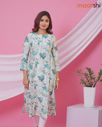 Rayon readymade A-line kurti cream and pastel green with allover floral prints & simple neck pattern and without pant