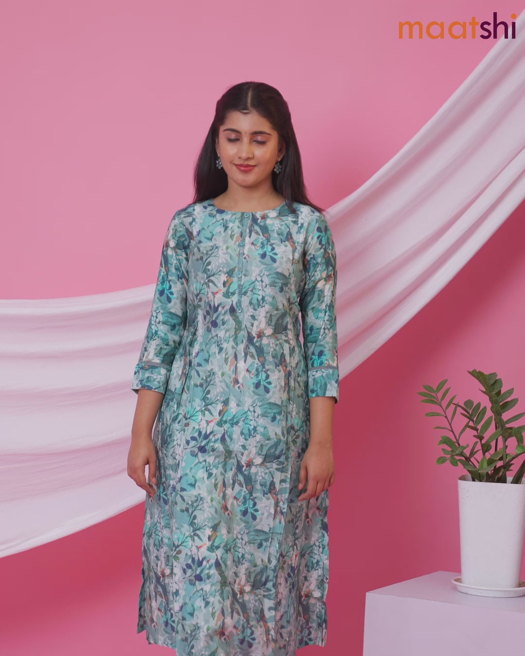 Rayon readymade A-line kurti teal blue with allover floral prints & simple neck pattern and without pant