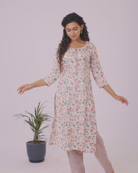 Rayon kurti set off white and multi colour with allover floral prints & simple neck pattern and straight cut pant
