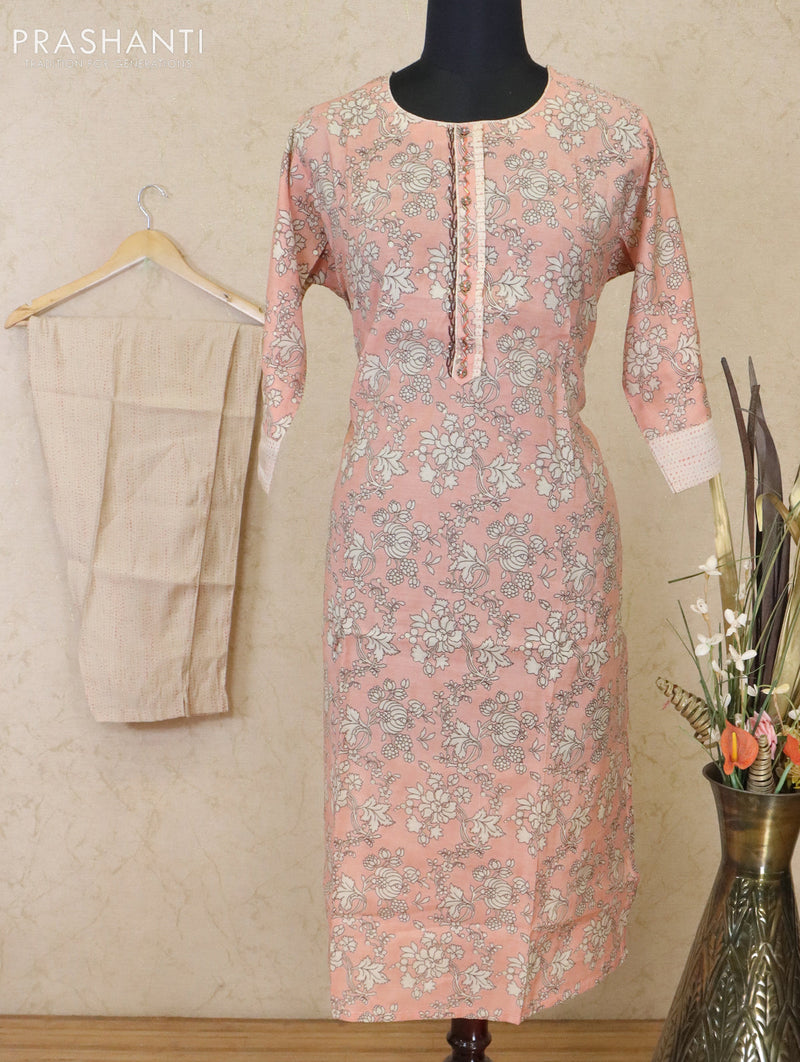 Muslin readymade kurti peach and cream with allover prints & beaded neck pattern and straight cut pant