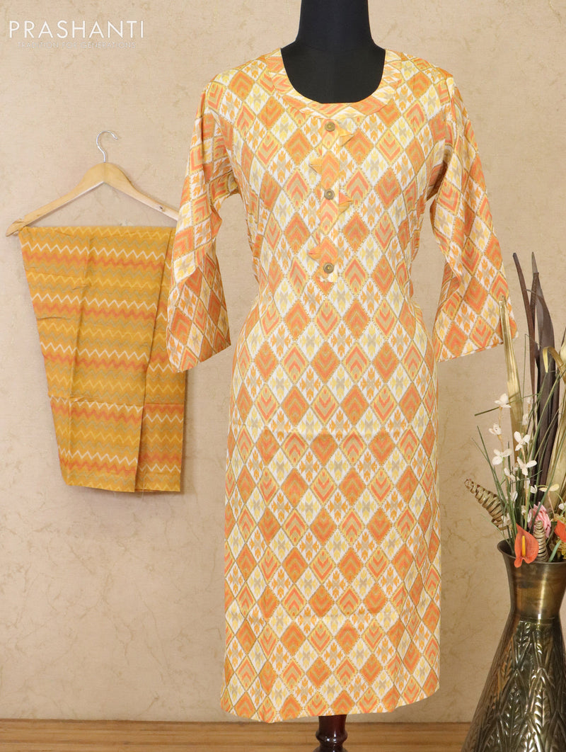 Slub cotton readymade kurti off white and yellow with allover ikat prints & patch work neck pattern and straight cut pant