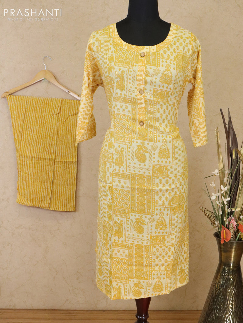 Slub cotton readymade kurti pale yellow with allover prints & patch work neck pattern and straight cut pant