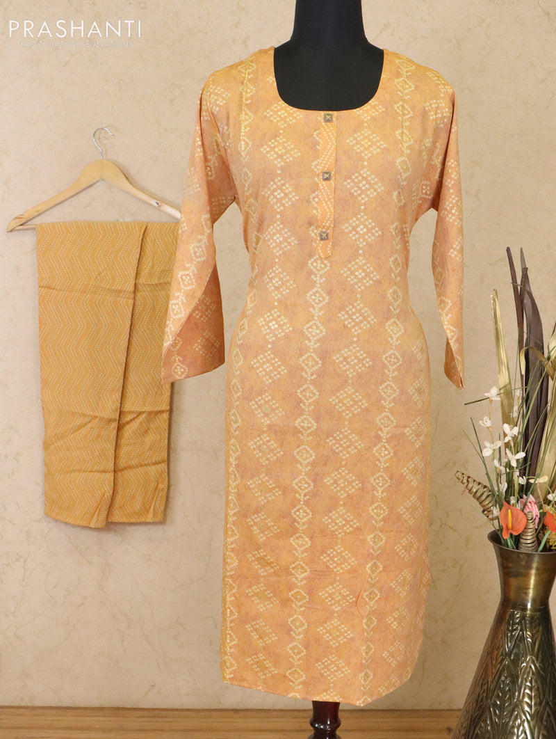 Slub cotton readymade kurti mustard yellow with allover bandhani prints & patch work neck pattern and straight cut pant