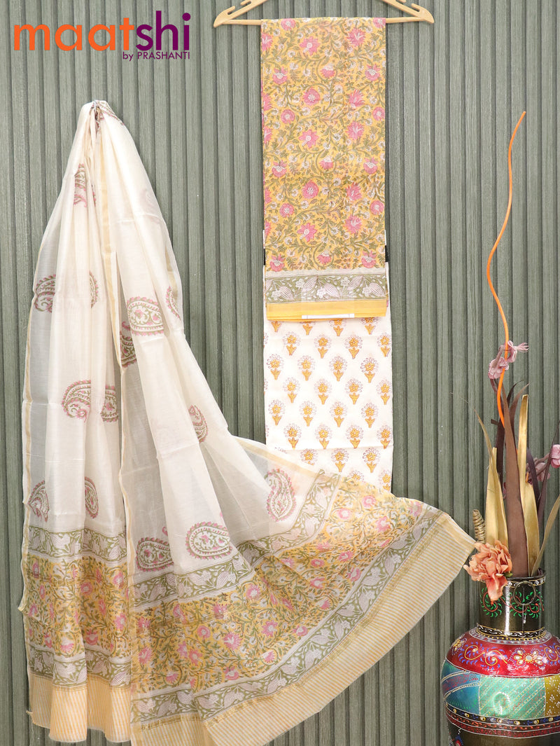 Pure chanderi dress material yellow and off white with allover prints and small zari woven border
