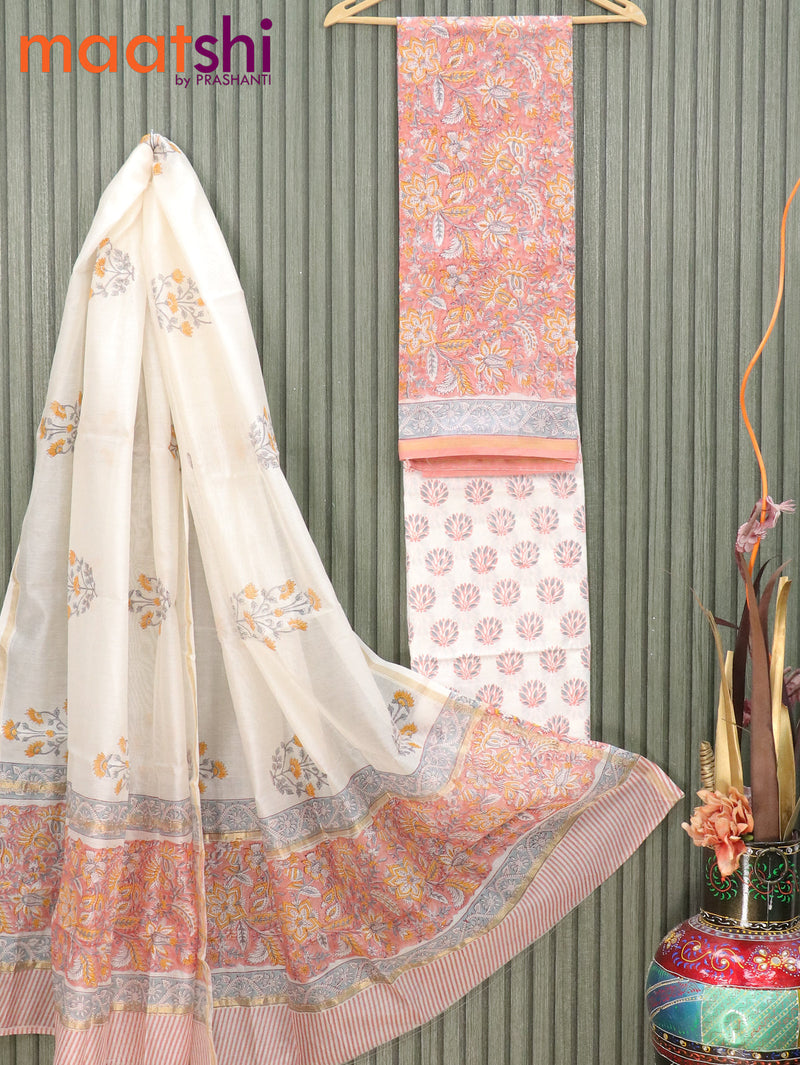 Pure chanderi dress material peach orange and off white with allover kalamkari prints and small zari woven border