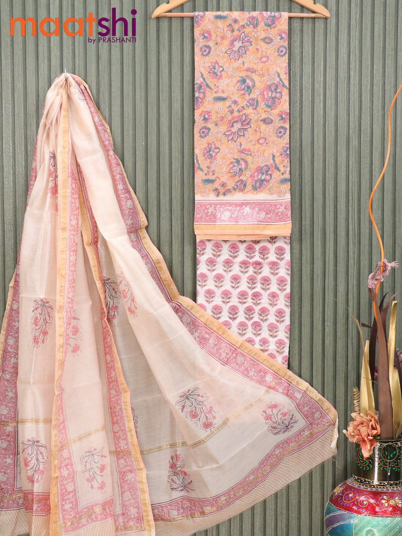 Pure chanderi dress material peach orange and off white with allover floral prints and small zari woven border
