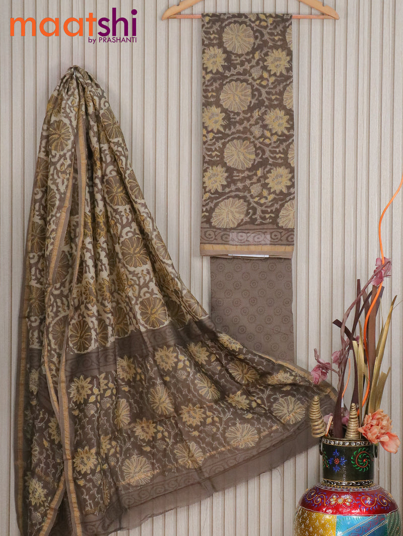 Pure chanderi dress material brown shade with allover prints and small zari woven border