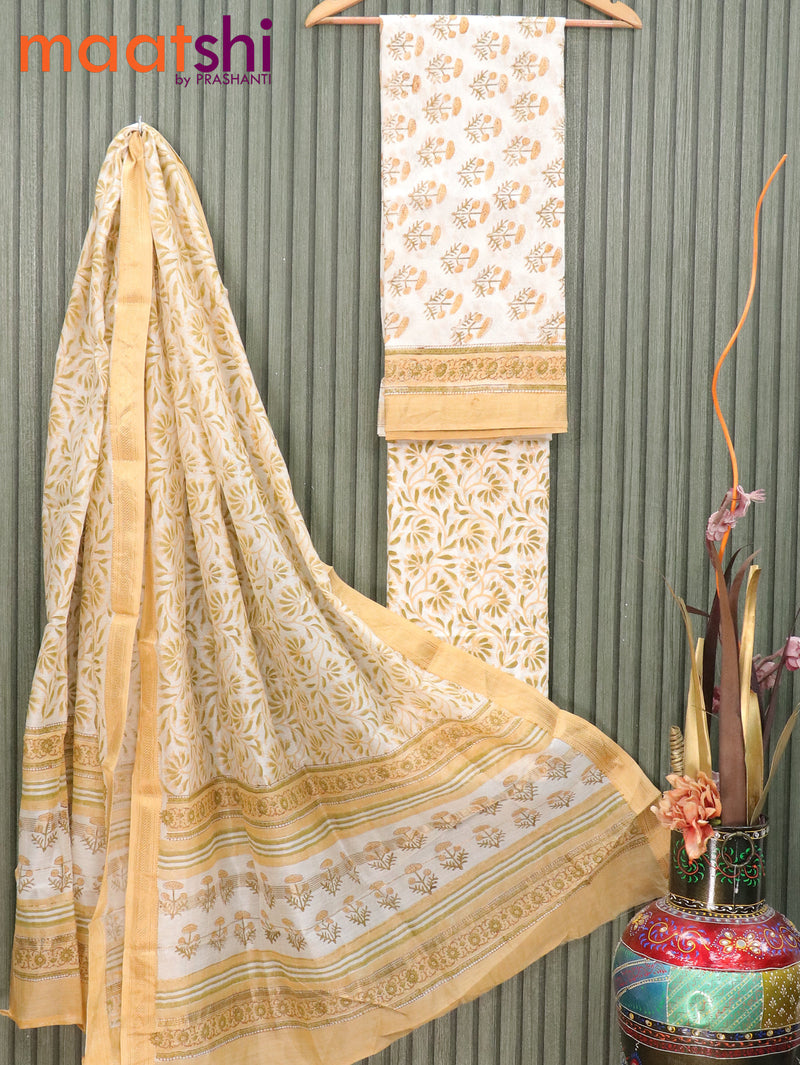 Pure chanderi dress material off white and sandal with floral butta prints and maheshwari border
