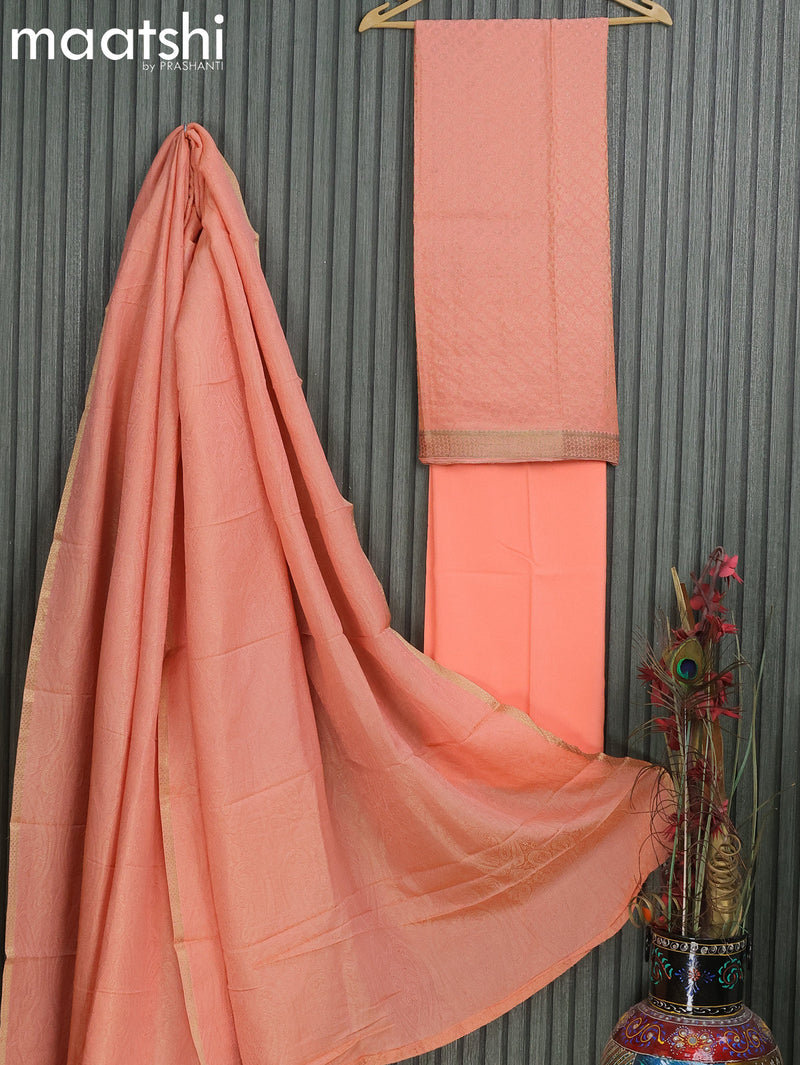 Mysore silk dress material peach orange with allover zari weaves and zari woven border