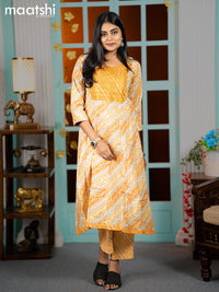 Cotton readymade anarkali kurti yellow shade with allover floral prints & sequin embroidery work neck pattern and straight cut pant