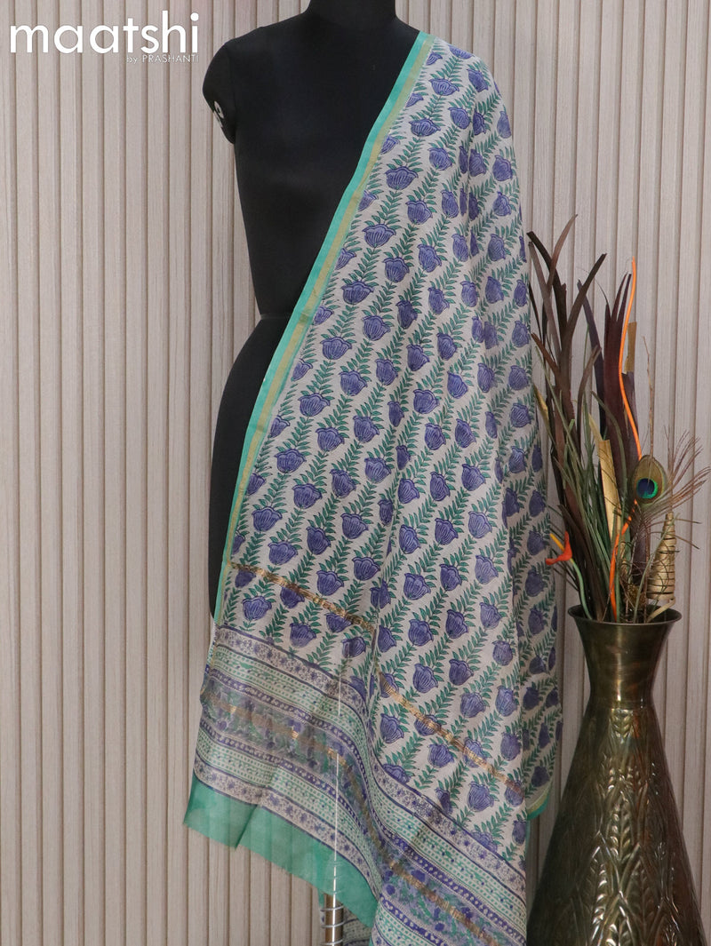 Chanderi dupatta off white and teal green with allover floral prints and small zari woven border
