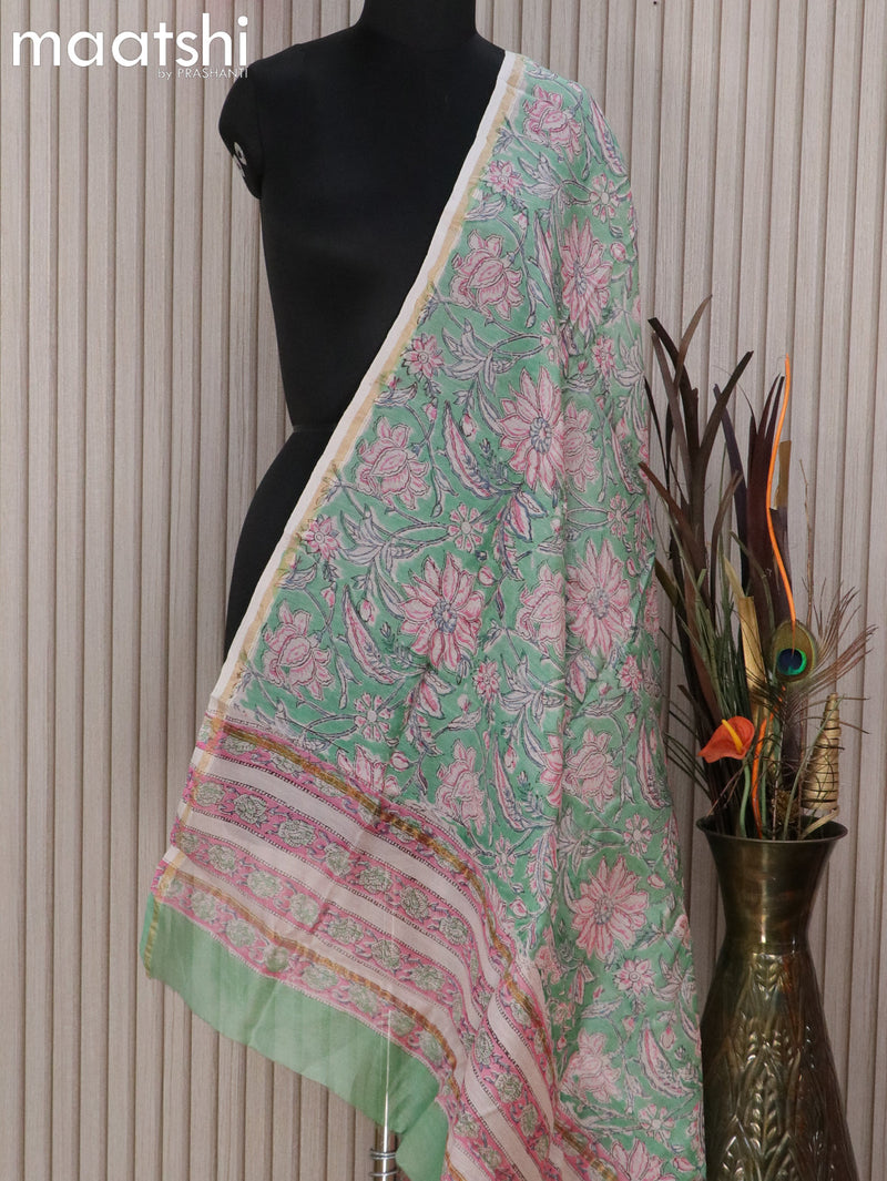 Chanderi dupatta green shade with allover floral prints and small zari woven border