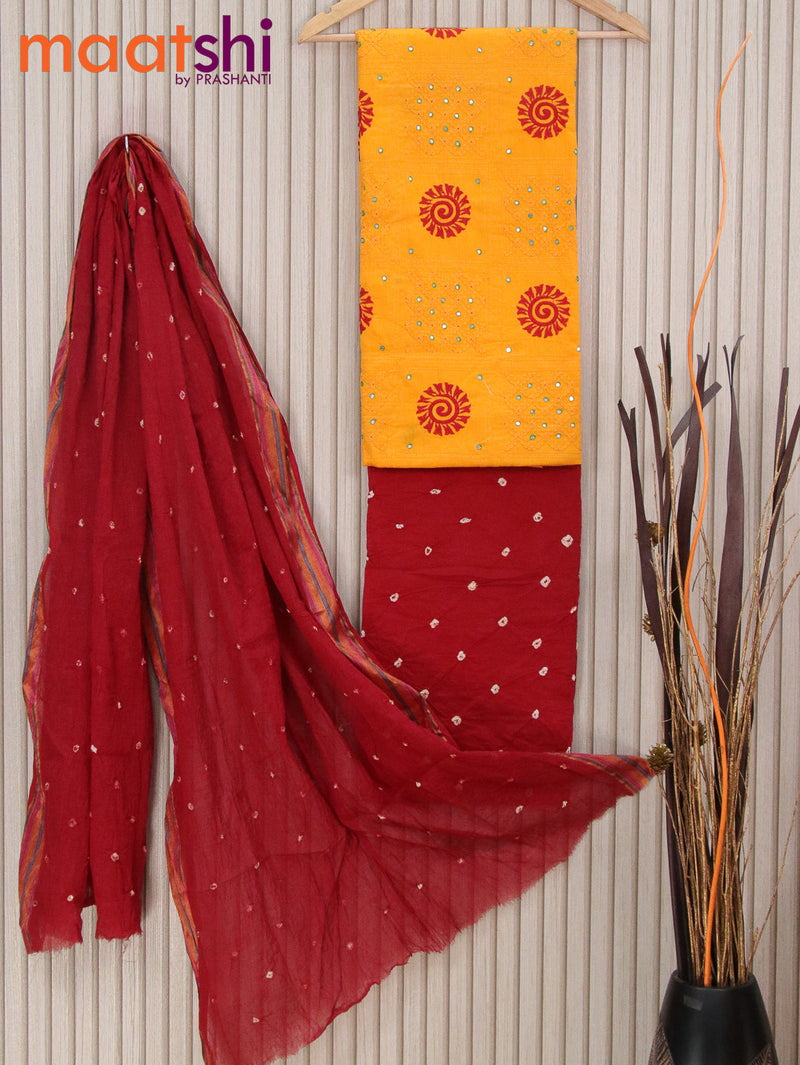 Cotton dress material mango yellow and maroon with allover mirror & embroidery work and bandhani bottom & dupatta