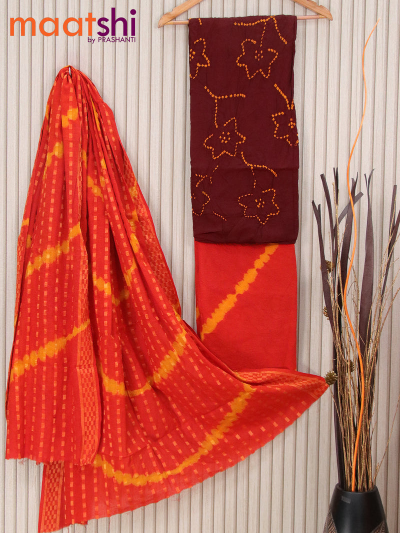 Cotton dress material deep maroon and orange with allover bandhani prints and bottom & dupatta