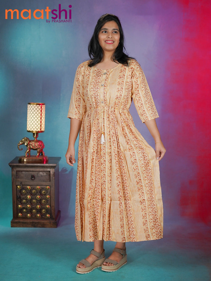 Soft cotton readymade umbrella kurti pale orange with allover batik prints without pant