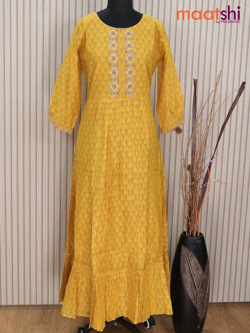Raw silk readymade floor length kurti mustard yellow with allover prints & embroidery work neck pattern without pant