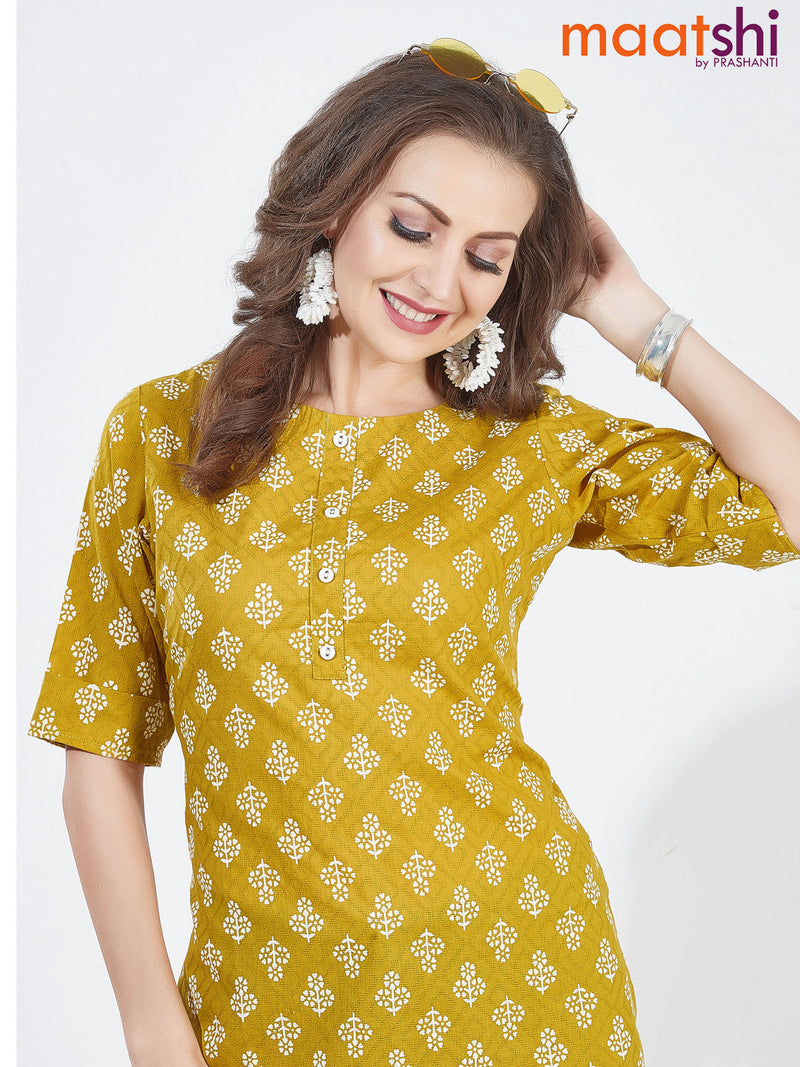 Cotton readymade short kurti lime yellow with allover prints & simple neck pattern without pant