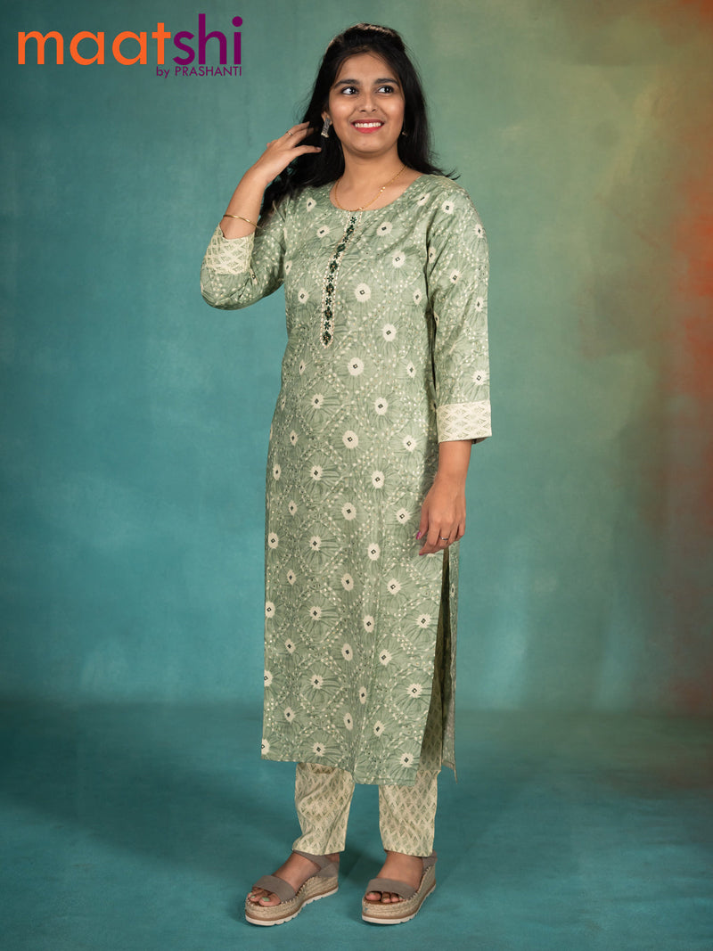 Rayon readymade kurti pastel green and cream with allover prints & embroidery work neck pattern and straight cut pant