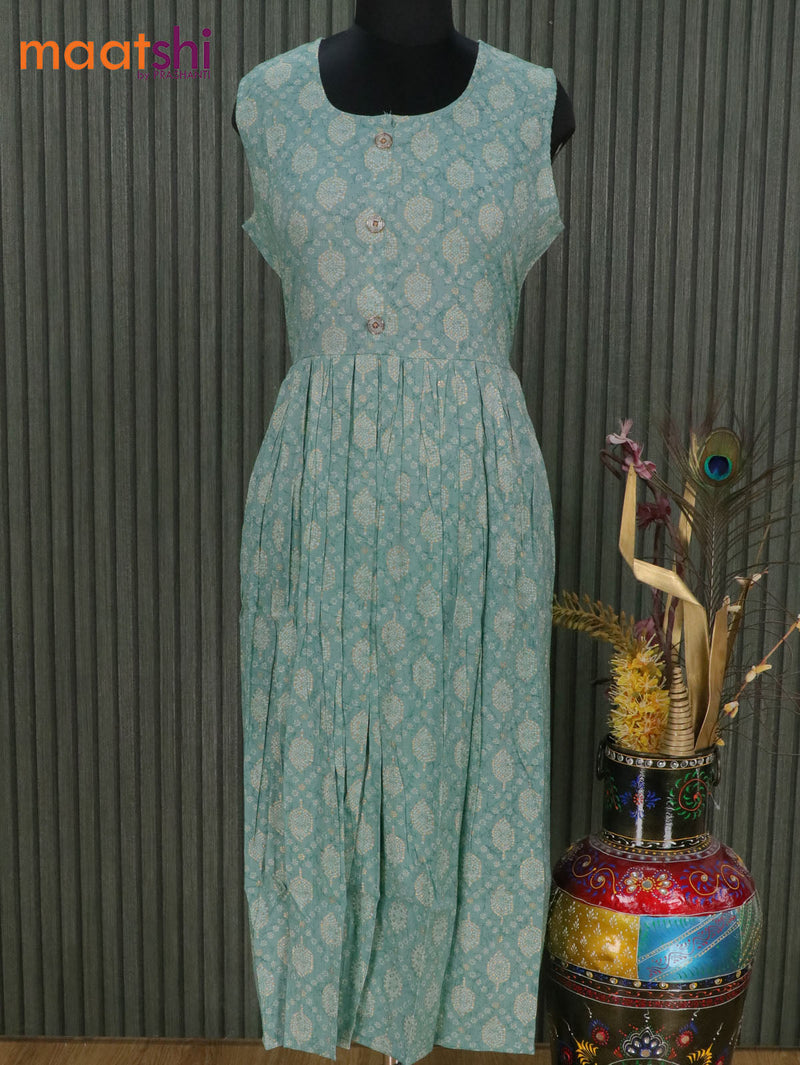 Slub cotton readymade umbrella kurti pastel green with allover prints simple neck pattern & sleeve attached without pant