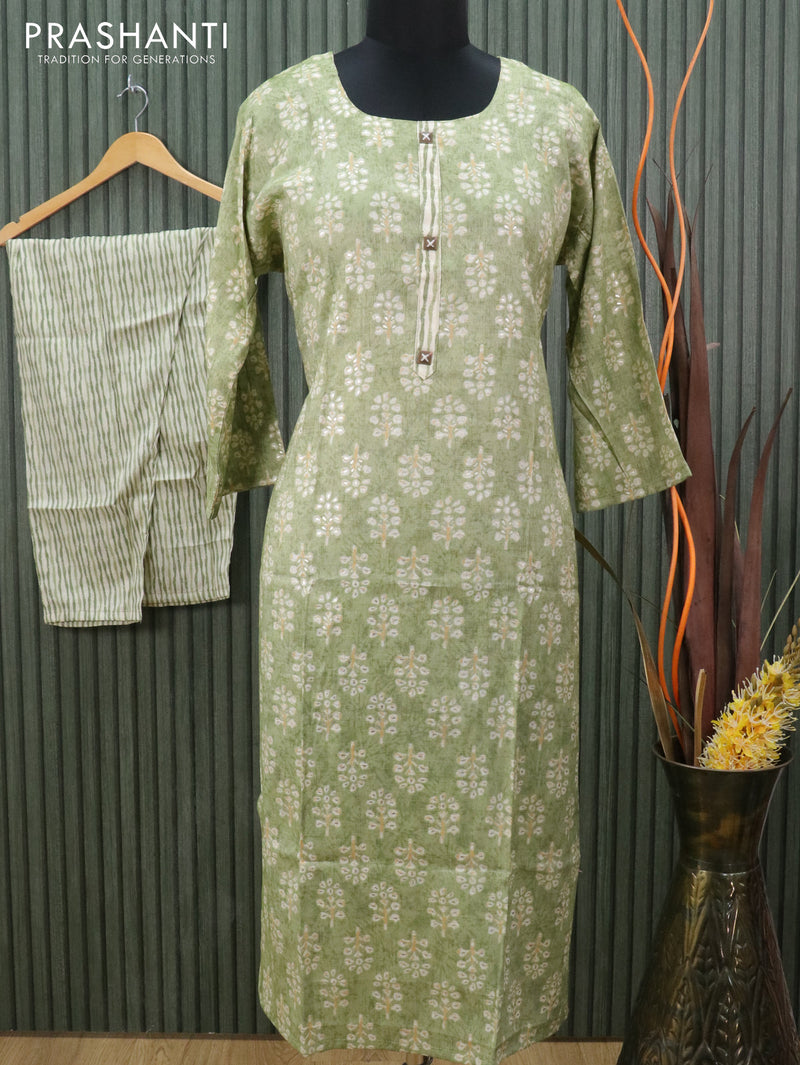 Slub cotton readymade kurti green shade and off white with allover floral butta prints and straight cut pant