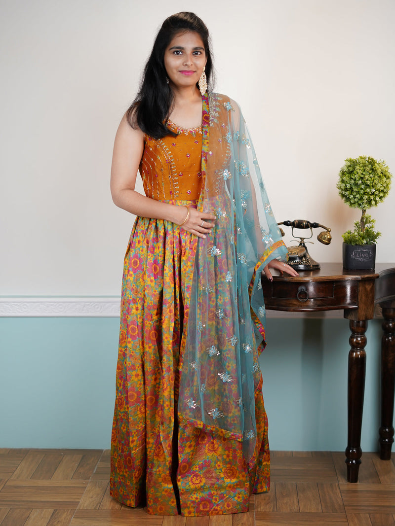 Raw silk floor length dress mustard yellow and dual shade of blue with allover embroidery stone work & allover prints and sequence work dupatta & attached sleeve
