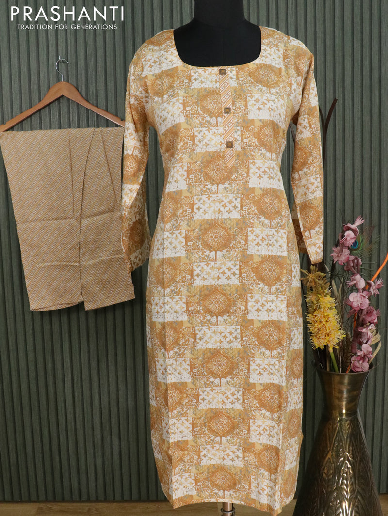 Slub cotton readymade kurti mustard yellow shade with allover prints and straight cut pant