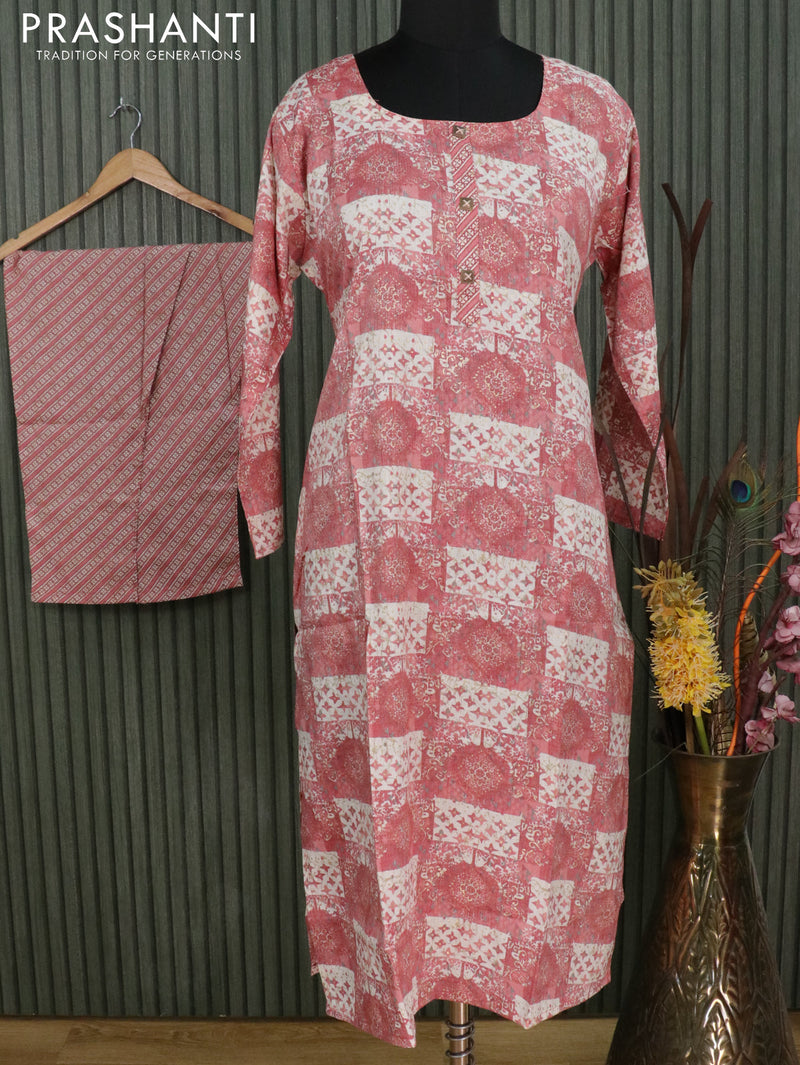 Slub cotton readymade kurti pink shade and off white with allover prints and straight cut pant