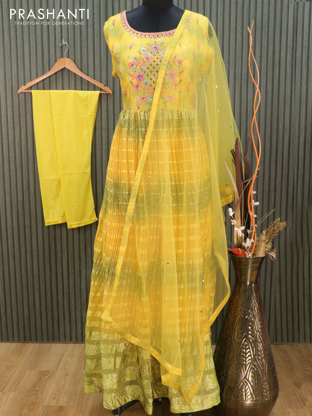 Muslin readymade floor length kurti yellow and light green with allover bandhani prints attached paded & floral embroidery mirror work neck pattern and pant & netted dupatta