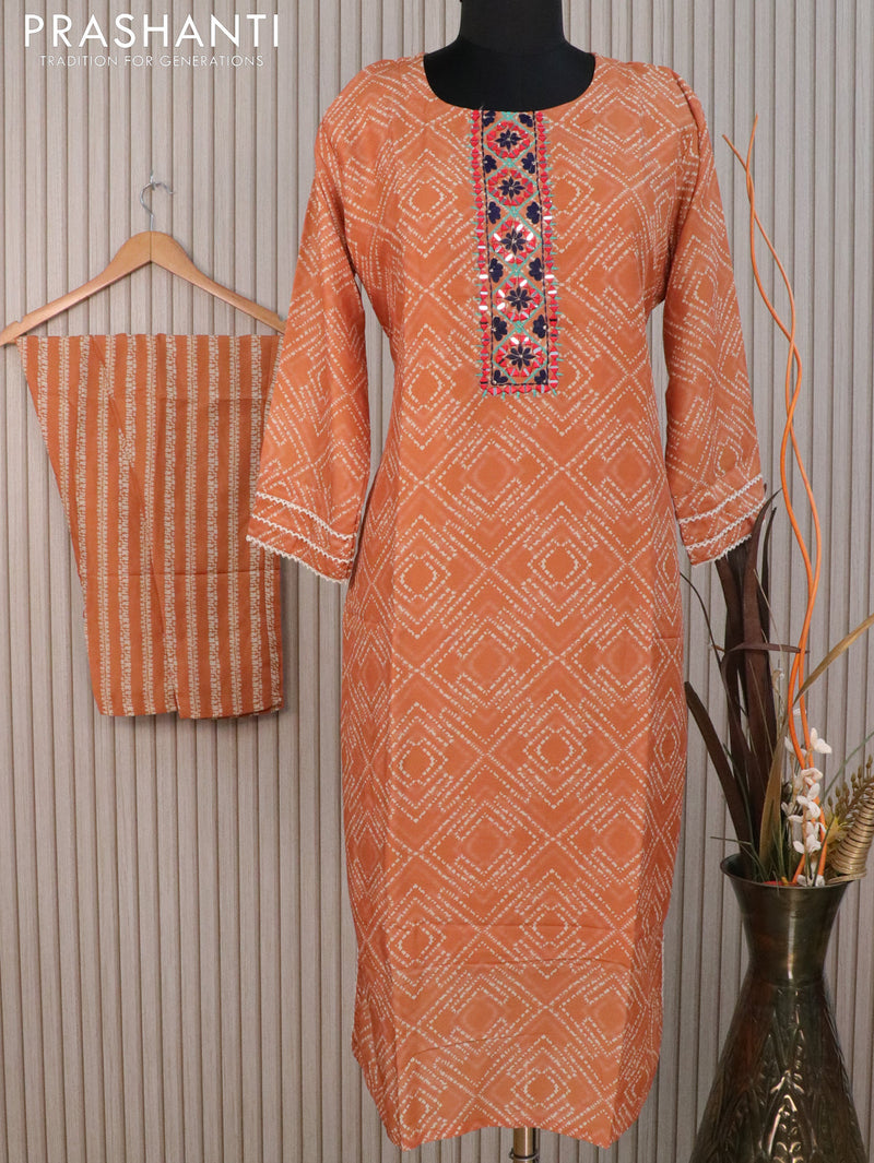 Muslin readymade kurti dual shade of orange with allover prints & mirror work neck pattern and straight cut pant