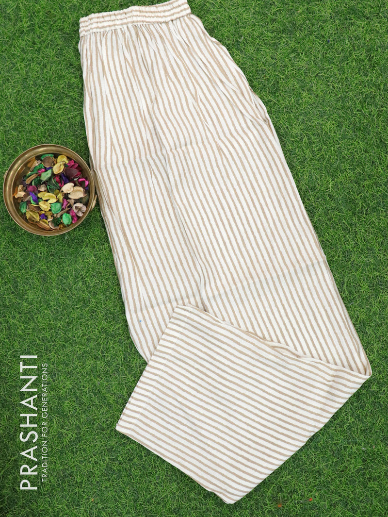 Modal readymade kurti cream with simple embroided mirror neck pattern and straight cut pant