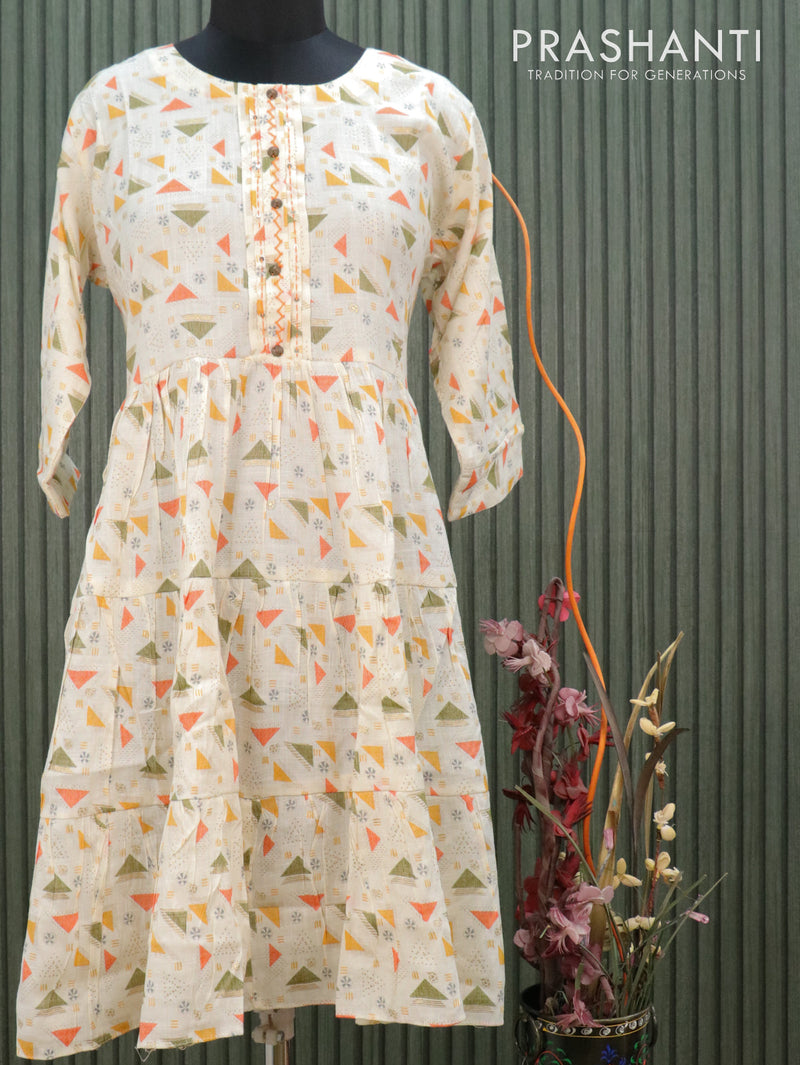 Slub cotton readymade kurti off white and orange with allover geometric prints & patch work neck pattern without pant